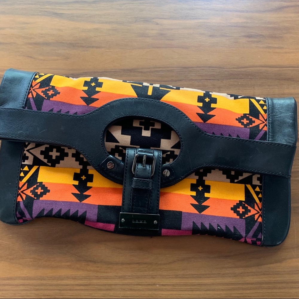 Lamb convertible clutch.